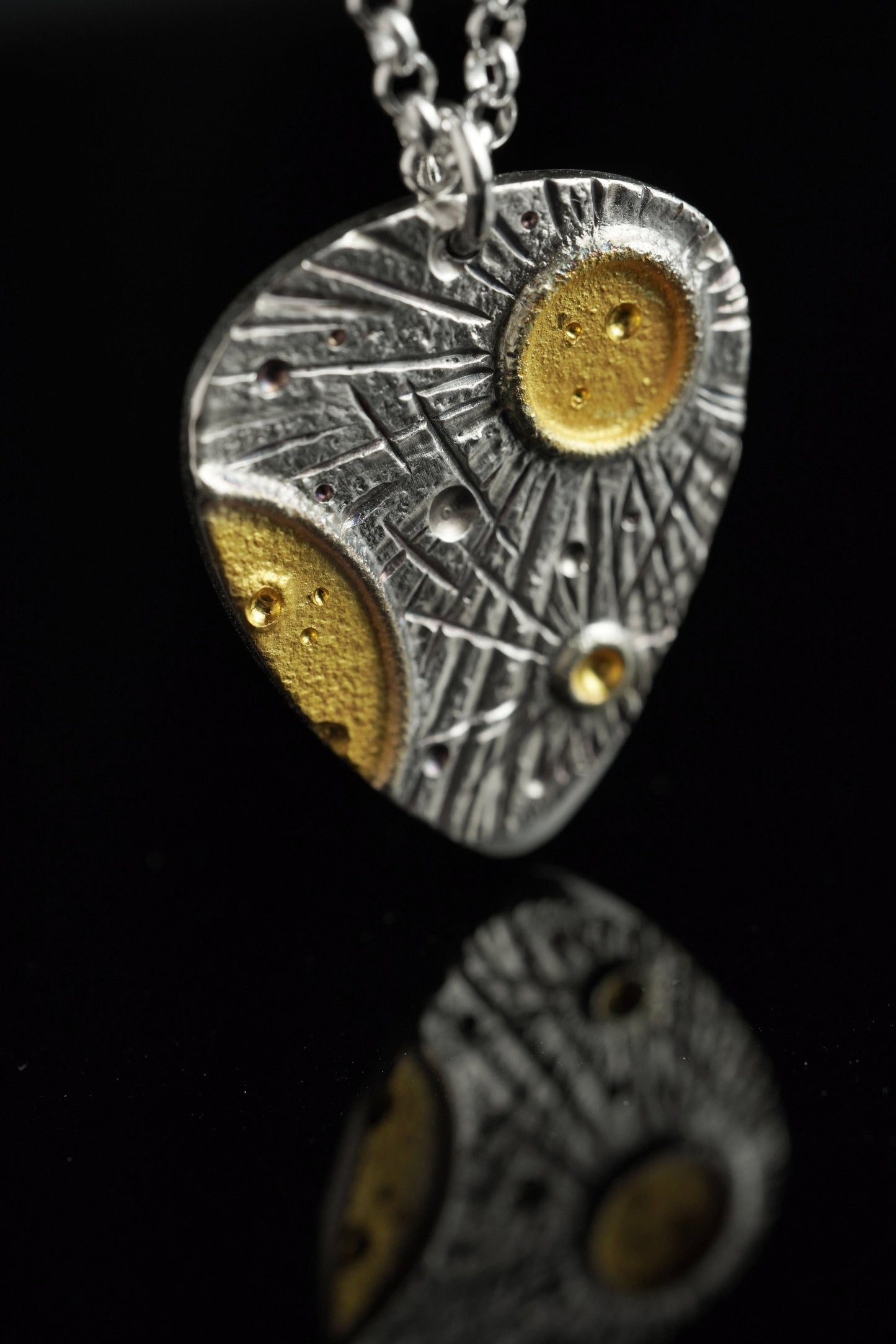 Crater Pendant (Guitar Pick)