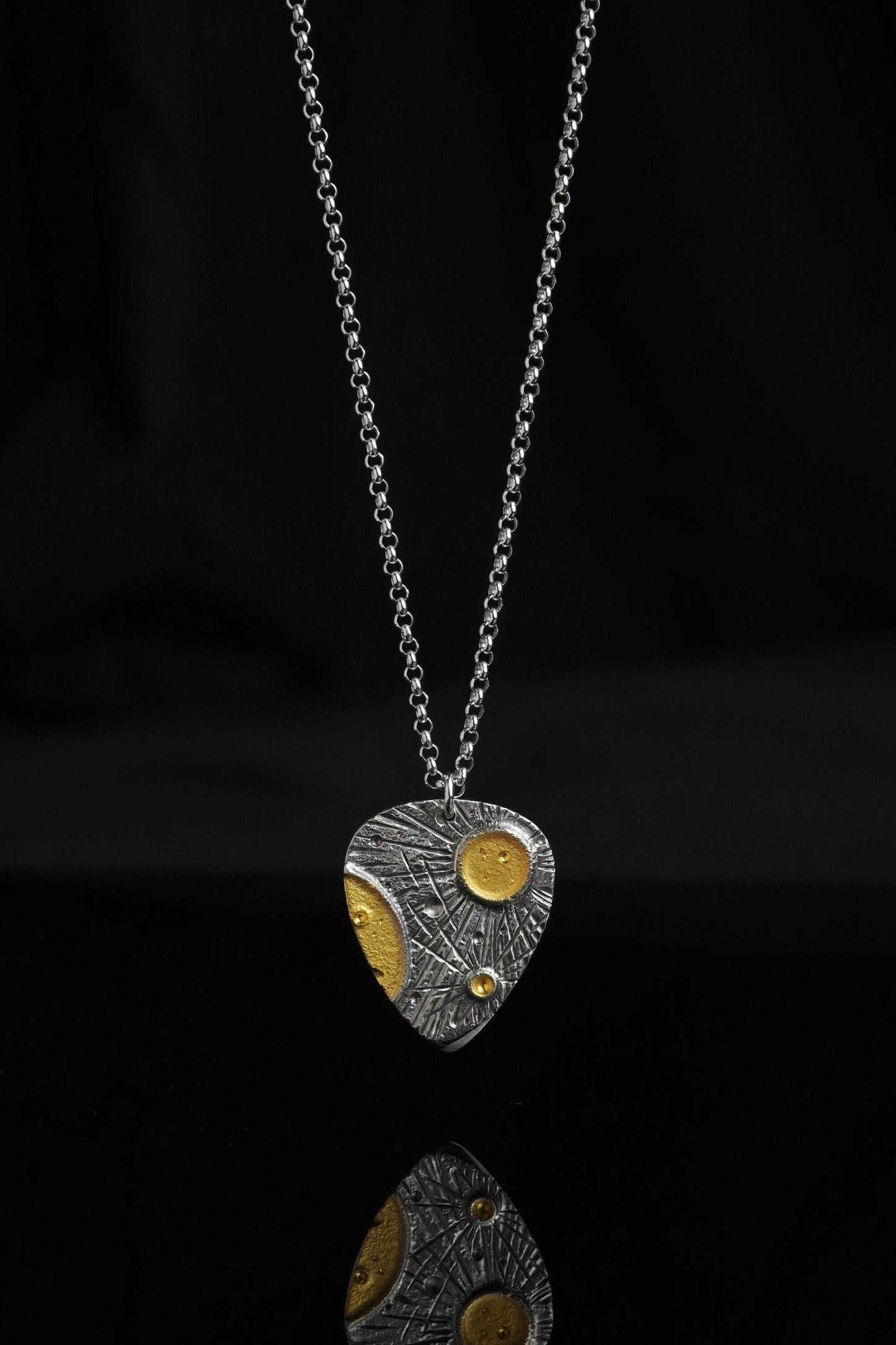 Crater Pendant (Guitar Pick)