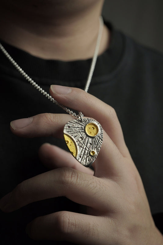 Crater Pendant (Guitar Pick)